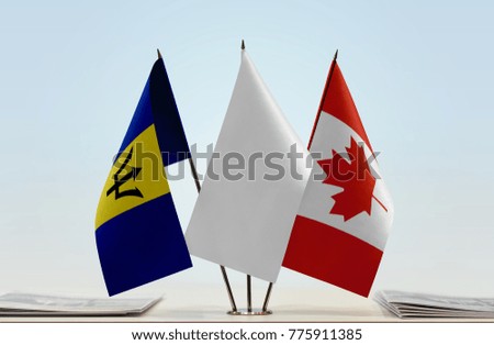 Flags of Barbados and Canada with a white flag in the middle