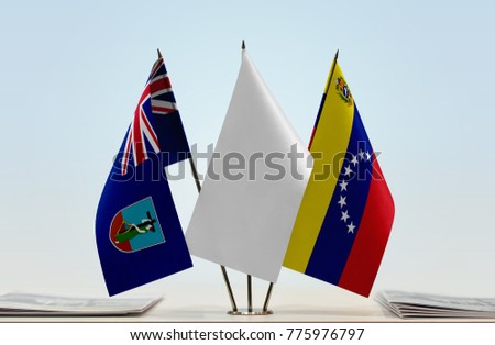 Flags of Montserrat and Venezuela with a white flag in the middle