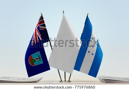 Flags of Montserrat and Honduras with a white flag in the middle