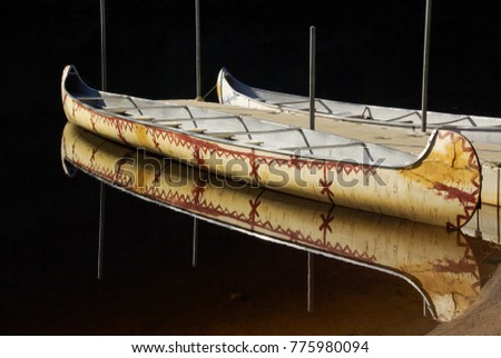 Moored Birch Bark Canoe in Evening Light
