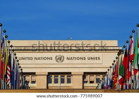 Palace of Nations - seat of the United Nations in Geneva, Switzerland. Flags of all countries. (written in English and french - United Nations)
