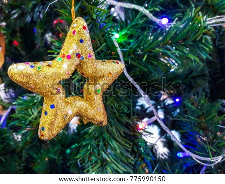 christmas and star in tree, there are gift boxes and lights.