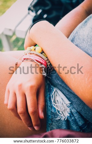 Female hands with bracelets