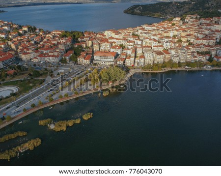 Aerial panoramic view of the wonderful Kastoria town. It is a traditional gorgeous town built on the hills on the shores of Lake Orestiada, Macedonia, Greece.