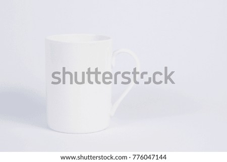 Close up of a simple white mug for templates, pictures and quotes on a white background