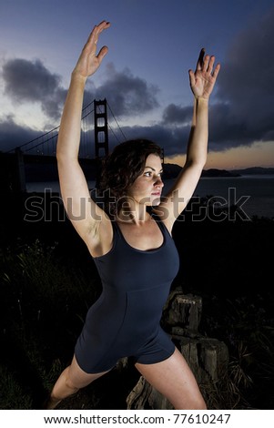 A beautiful ballerina posing in front of the Golden Gate Bridge in San Francisco