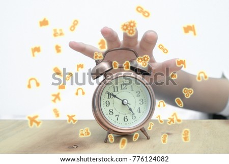 Hands are stopping the alarm clock.
The show is about waking up.Image Icon for Interest.
