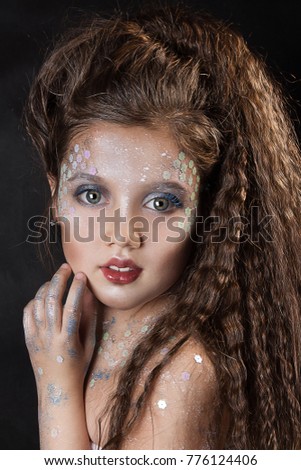 close up portrait of beautiful girl with professional makeup. long beautiful hair