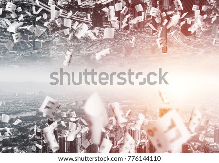 Abstract image of two modern urban worlds located among flying papers and upside down to each other on the sky background. Wallpaper, backdrop with copyspace.