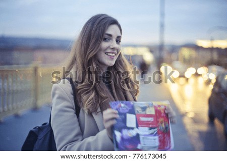 Tourist holding a city map

