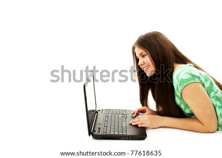 Beautiful and happy girl with a laptop, isolated on white