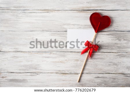 Red Candy Lollipop And Blank Note On Grey Rustic Wood Background Valentines Theme