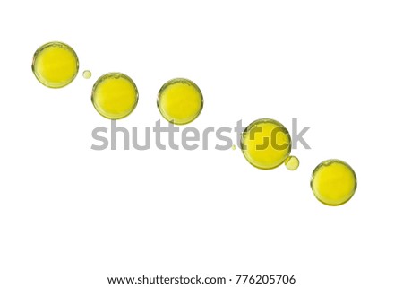 Yellow colored bubbles isolated over a white background.