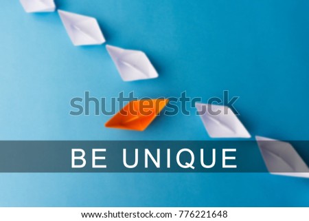 Stand Out From The Crowd Concept Paper Boat - Be Unique
