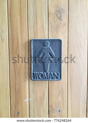 Toilet woman sign