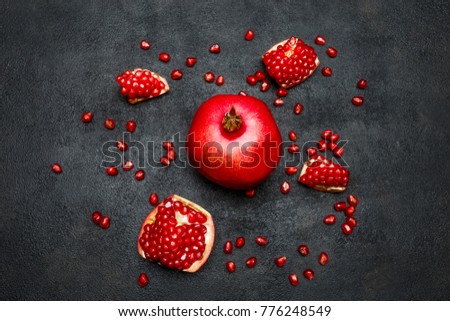 Pomegranate and seeds close-up