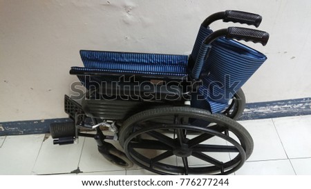 Wheelchairs parked inside the hospital.