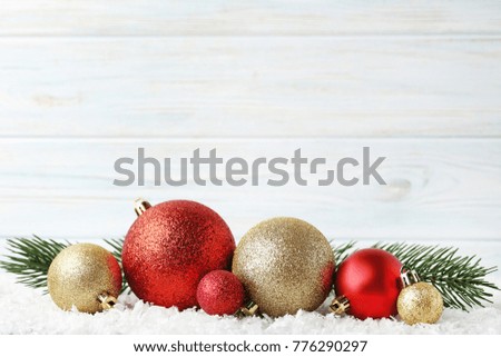 Christmas baubles with fir tree branch