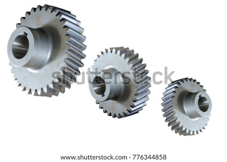 Gear on white background, set of toothed wheels that work together to alter the relation between the speed of a driving mechanism 