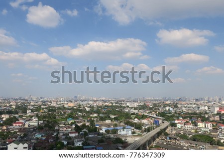 Landscape of trees, buildings and sky