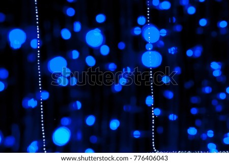 Abstract gold bokeh and Colorful lights background with place for text. Beautiful Festive textured background. Vintage defocused background
