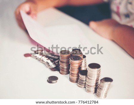 The girl Saving money for future education.
