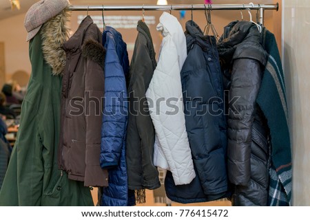 Winter jackets on a hanger