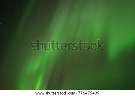 Green northern aurora lights in Tromsø, Norway