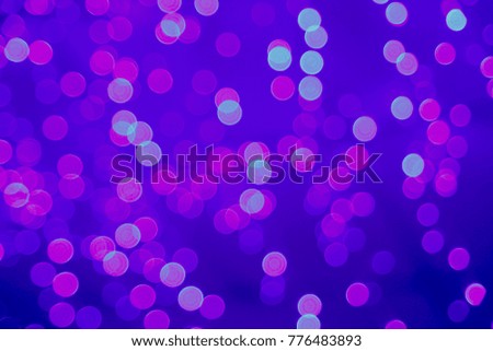 Ultraviolet wallpaper design. Abstract colorful bokeh light bokeh background. Psychedelic pattern. Neon light. Hollywood style bokeh. Purple defocused night street brightly violet festive background
