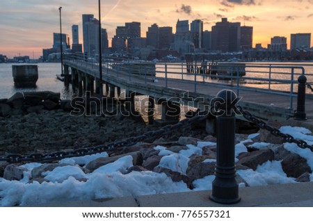 View of Walkway to Dock With Downtown Boston on the Background