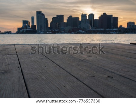 Wooden Dock with Downtown Boston in the Background and out of focus