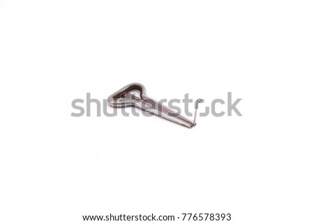 Closeup of a kazakh traditional jew's harp shankobyz isolated on white background