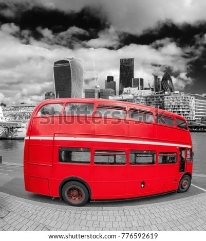 Double decker bus with modern city center in London, England, UK