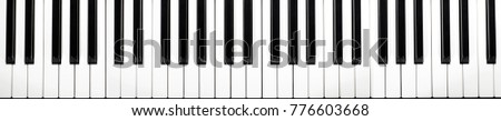musical keyboard isolated, top view (more than four octaves) Royalty-Free Stock Photo #776603668