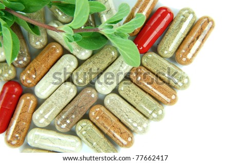 herbal supplement capsules Royalty-Free Stock Photo #77662417
