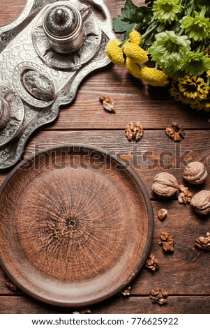 Rustic empty plate. Creative wood background concept