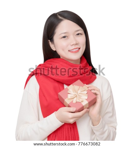 Asian woman holding a gift box