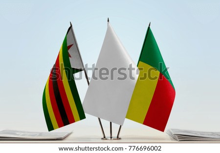 Flags of Zimbabwe and Benin with a white flag in the middle