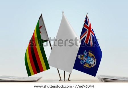Flags of Zimbabwe and Tristan da Cunha with a white flag in the middle