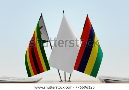 Flags of Zimbabwe and Mauritius with a white flag in the middle