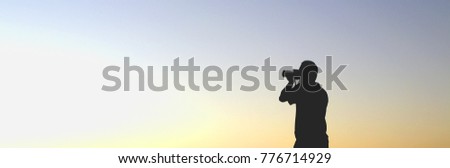 Photographers, silhouette of photographers and sunset.