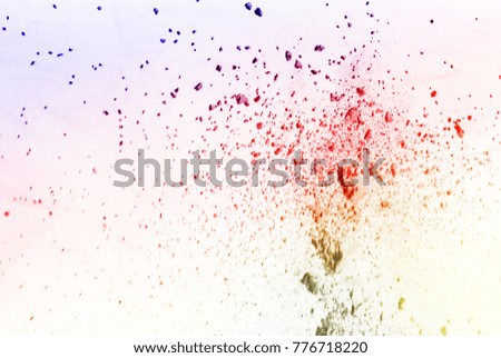 abstract powder splatted background,Freeze motion of color powder exploding/throwing color powder,color glitter texture on black background
