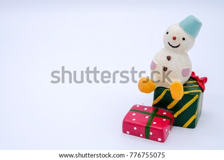 There are Christmas them, santa claus and snowman are on the snow with white and isolated background, they are so cute.