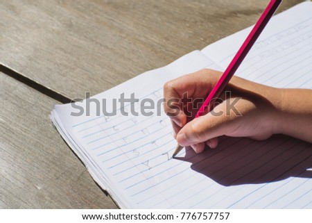 kid doing homework at home