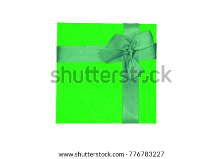 Gift box with red ribbon bow .
