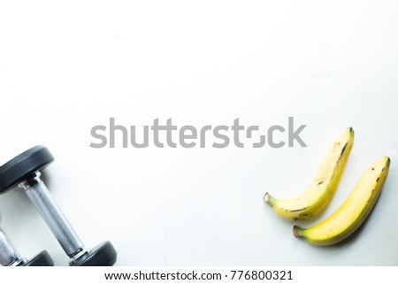 Healthy lifestyle Fit background.Gym equipment with healthy food on white background isolated