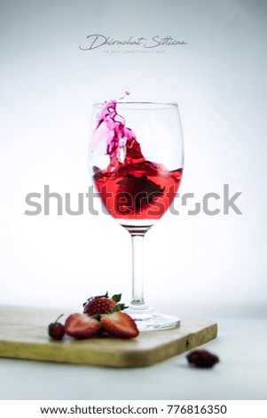 Strawberry juice splash on a white background