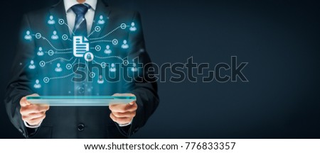 Corporate data management system (DMS) and document management system with privacy theme concept. Businessman with tablet and scheme with protected document connected with users.