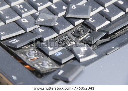 A broken old laptop keyboard - notebook crash