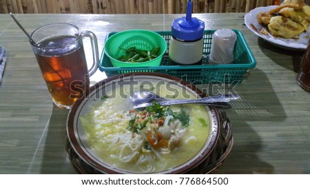 bakmi jawa dan jahe anget javanese mie with hot tea Royalty-Free Stock Photo #776864500